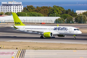 An Air Baltic Airbus A220-300 with registration number YL-AAO at Lisbon Airport