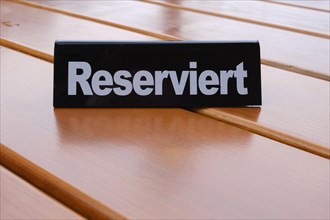 Sign Reserved on the table of a restaurant