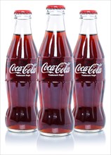 Coca Cola Coca-Cola lemonade soft drink drinks in bottles cut-out isolated against a white background