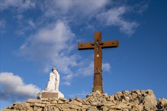 Summit cross and Jesus figure on Monte Castellaz
