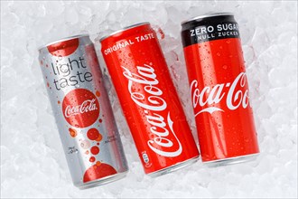 Coca Cola Coca-Cola Products Lemonade Soft Drink Beverages in Cans on Ice Ice Cube