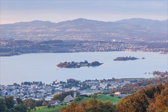 View at sunset from Feusisberg over Lake Zurich with the islands of Ufenau and Luetzelau