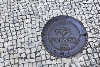 Manhole cover with the inscription Expo 98