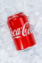 Coca Cola Coca-Cola can lemonade soft drink drink on ice cube cubes