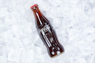 Coca Cola Coca-Cola bottle lemonade soft drink drink on ice cube cubes