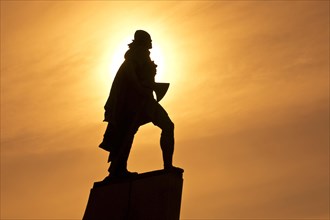 Statue of Leif Eriksson in the backlight