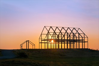 Hall house at sunrise on the North Germany slag heap