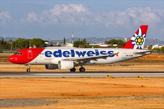An Edelweiss Airbus A320 with registration HB-IHX at Faro Airport