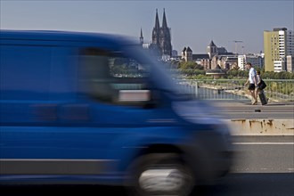 Traffic on the Zoobruecke with cathedral in the background