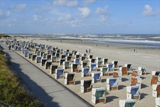 Empty beach chairs on the sandy beach