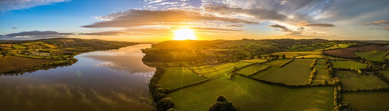 Panorama of Sunrise over Fields and River Teign from a drone