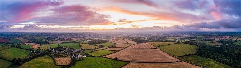 Sunset over the fields from a drone