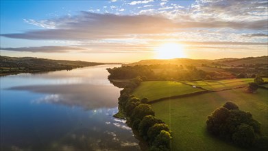 Sunrise over Fields and River Teign from a drone