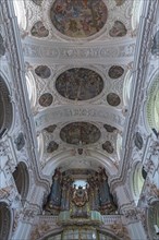Baroque ceiling vault with organ loft of the collegiate basilica
