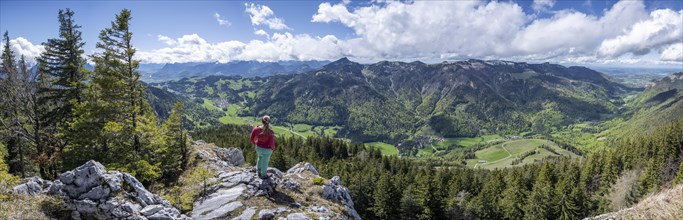 Hiker looking over the Chiemgau valley