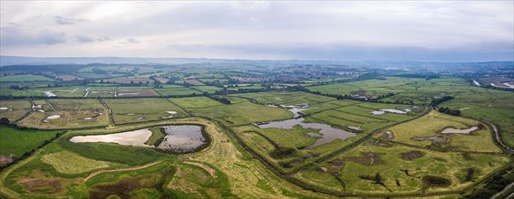 Wetlands and meadows in RSPB Exminster and Powderham Marshe from a drone