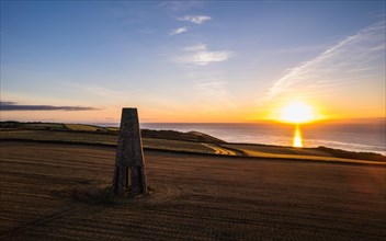 Sunrise over The Daymark from drone
