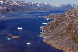 Icebergs and ice in a fjord