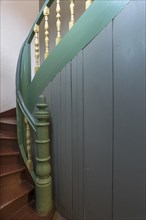Staircase with banister of the 1920s in a residential house