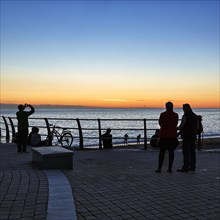 Visitors on Seafront Promenade