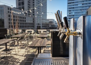 Taps of a bar on the terrace of the Bikini Haus