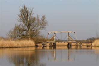 Historic wooden drawbridge over the Trebel near Nehringen