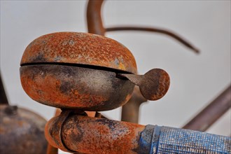 Rusty handlebar of bicycle with bell