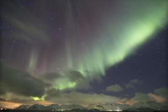 Northern lights over the mountains near Svolvaer
