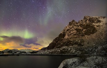 Northern lights over the mountains near Svolvaer