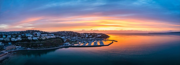 Panorama over Torquay and Torquay Marina from a drone in dawn time