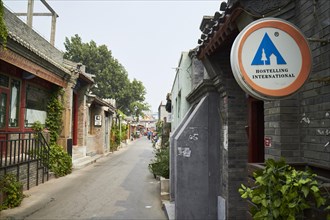 Hosteling International sign on street in Jianchang Hutong