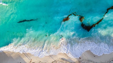 Aerial of the the turquoise waters of Cancun