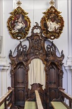Richly carved confessional