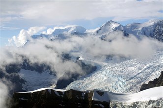 Snow-capped mountains and flowing glaciers