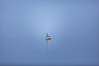 Fishing vessel alone at sea