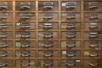 Drawers with spare parts for umbrellas