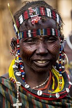 Scar face as a mark of beauty woman from the Jiye tribe