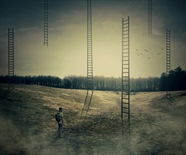 Young boy on a mystic meadow with a lot of ladders going high in the sky