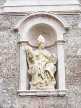 Stone sculpture of St. Kassian
