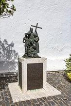 Bronze statue of the priest Pedro Camps