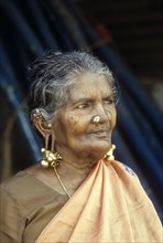 An old woman wearing Tandatti