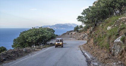 Beach Buggy on Street with Sea View