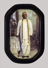 Laminated portrait of Nattukottai Chettiar in Chettinad