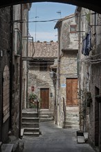 Picturesque alley with steps leading to the entrances