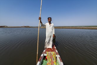 Marsh arab on his boat