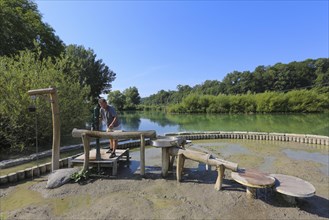 Man at the water playground