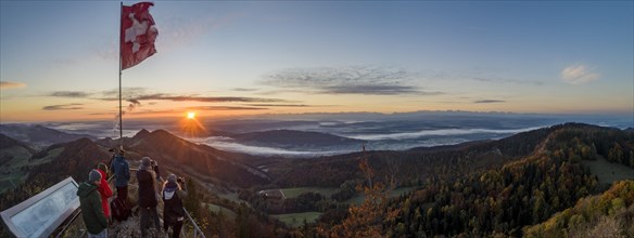 Sunrise with autumn fog with alpine panorama