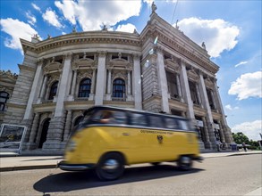 Old post bus in front of the Burgtheater