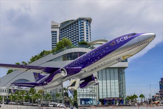 Terminal 21 building and aircraft with SCB Bank advertising Pattaya