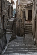 Picturesque alley with many steps